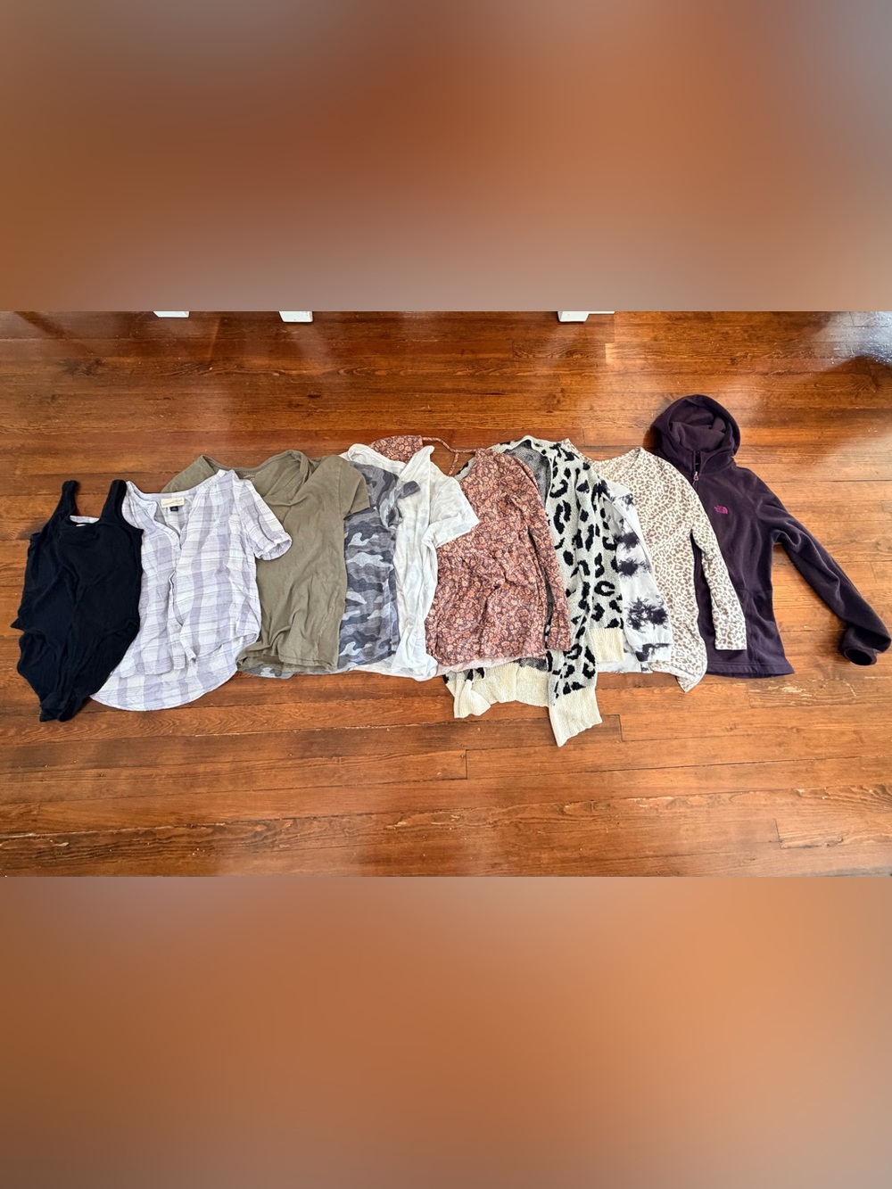 Bundle of women’s size medium clothing tops/sweaters and body suit